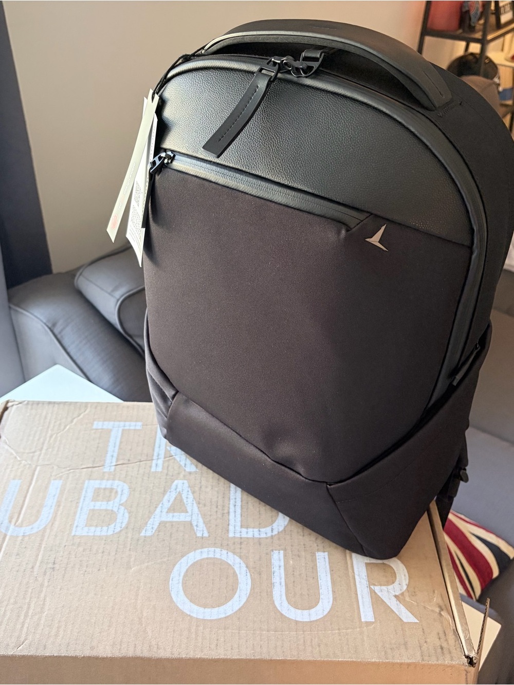 Black Men's Tech Backpack with Sleek Minimal Logo
